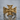 Maltese Cross Skull Ring, gold vermeil, front product photo on wet stone