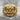 Japanese Oni Demon Ring, gold vermeil, front view on stone pedestal