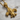 Fleur De Lis Pendant, gold vermeil, angled front view on wood