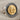Lydian Lion Coin Earring, two-tone, product photo on linen