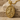 Saint Francis Pendant, gold vermeil, product photo on stone
