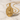 Saint Barbara Pendant, gold vermeil, angled view on marble surface