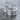 Two Finger Spell Storing Ring, polished silver finish, angled view on wet stone