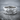 Creation of Adam Relief Ring, polished silver, product photo on stone surface