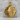 Lion Cross Pendant, gold vermeil, product photo on stone