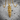 Lattice Skull Bullet Pendant, gold vermeil, product photo on stone