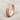 Lunar Moon Crater Ring, rose gold, angled product photo on fabric