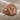 Aquarius Skull Ring in rose gold, angled product view on fabric