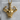 Double Bicep Bodybuilder Pendant, gold vermeil, product photo on display block