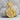 Orthodox Icon Pendant, gold vermeil, front product view resting against a stone