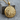 Celtic Shield Knot Pendant, gold vermeil, front view on wood block