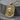 Bear Dog Tag Pendant in gold vermeil, angled front view on wood