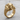 Elephant Head Ring, gold vermeil, angled view on wood