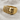 Skull Cloth Ring, gold vermeil, angled view on fabric