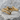 Transgender Pride Ring, gold vermeil, front view on stone surface