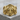 Praying hands cross ring in gold vermeil, front view on wood