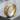 Grapevine band ring, gold vermeil, angled product view on wood