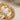 Roman Aqueduct Arch Ring, gold vermeil, close-up of arches and cubic zirconia rims