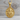 Saint Peter Apostle Relief Pendant, gold vermeil, front view on wood