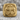 Medieval Cross Ring, gold vermeil, front view resting on stone