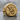 Archangel Michael Slaying Demon Ring, gold vermeil, angled front view on stone