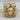 Laurel Tiger Head Pendant, gold vermeil, front view on wood block