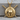 Spartan Shield Crossed Swords Pendant, gold vermeil, front view on wood block