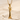 Bird letter I pendant in gold vermeil, front view resting on sand