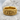 Skull Eternity Ring, gold vermeil, resting on stone
