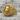 Greek Key Lion Ring, gold vermeil, angled view on stone