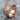 Tidal Wave Ring, rose gold, angled product photo on stone