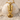 Nefertiti Crown Pendant, gold vermeil, product photo on shell
