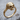 Skeleton Hand Skull Ring, gold vermeil, angled view on wood