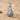 Gemstone Wing Swan Pendant, polished, angled front view on sand