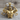 Front double bicep bodybuilder pendant, gold vermeil, front view on wood block