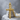 Tied Wood Cross Pendant, gold vermeil, product photo on stone surface