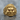 Fudo Myoo Ring, gold vermeil, front view on stone surface