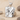 Doctor Coat Pendant, polished, product photo on sand