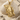 Butterfly Girl Pendant, gold vermeil, front view on beach sand