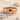 Hibiscus Band Ring, rose gold, product photo on sand