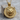 Snarling Bear Pendant, gold vermeil, product photo on wood block
