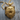 Roaring Grizzly Bear Pendant, gold vermeil, front view on wood block