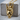 Rock On Skull Pendant, gold vermeil, product photo on wood block