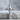 Memento Mori Skull Cross Pendant, polished silver, front product photo