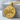 Eagle Yin Yang Pendant, gold vermeil, front view on stone pedestal