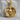 Winged Skull Medallion Pendant, gold vermeil, front view on display block
