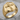 Pardon Crucifix Scrollwork Ring, gold vermeil, product photo on stone