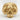 Scroll skull ring, gold vermeil, angled three-quarter view
