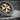 Maltese Cross Shield Cufflink, oxidized, angled close-up view