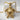 Spiral Shell Turtle Pendant, gold vermeil, front view on white stone